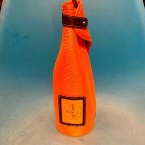 Vueve cliquot bottle holder. Orange. No issues. Never used.